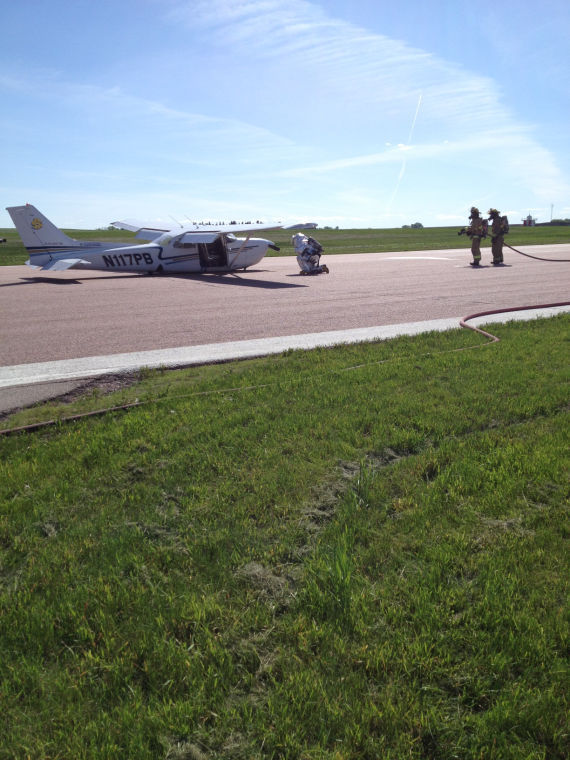 An SDSU aviation student is forced to make an unexpected emergency landing during a practice for an FAA practical test. The left main landing gear failed to retract completely.