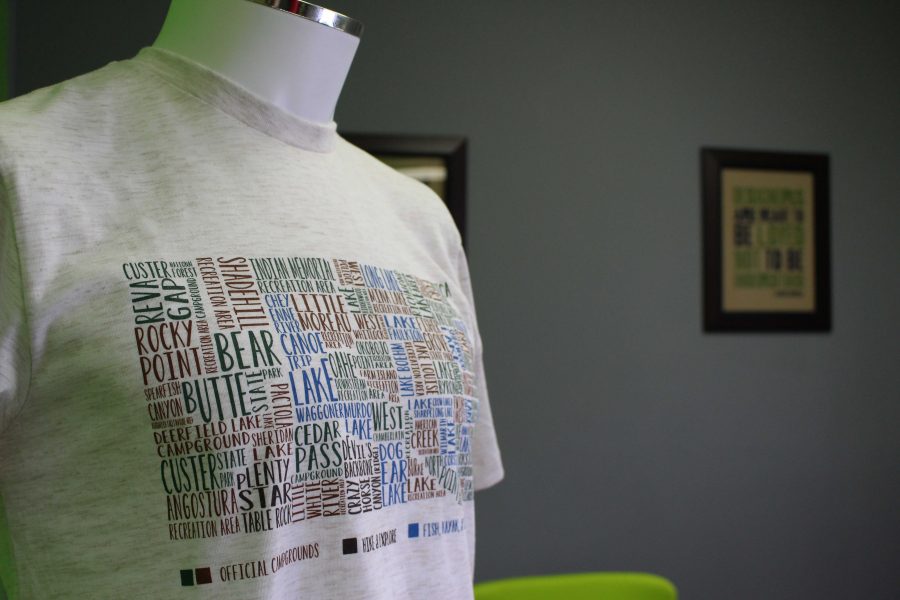 KELLY MITCHELL
One of the shirts for sale at 
Clean Slate shows all of the counties with the different campgrounds colorized by the different activities the campgrounds offer Nov. 6.