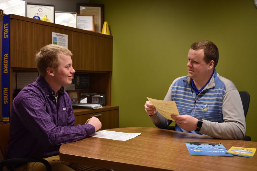 FILE PHOTO
Sam Johnson, agricultural business major, and Matt Tollefson, career coach, in a mock interview.