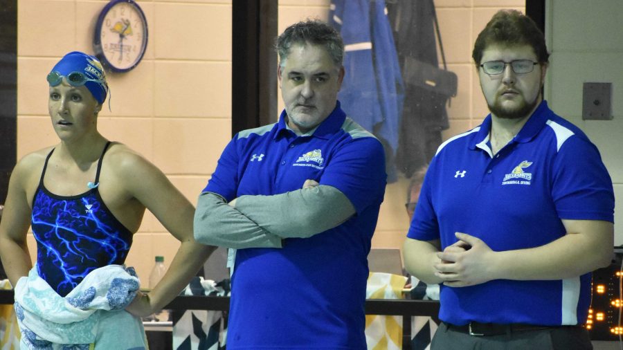 ABBY FULLENKAMP
Head swim coach Doug Humphrey and assistant Kaden Huntrods watch the 1,000 yard freestyle during the womens swim meet against UNI Friday, Jan. 26. The womens team is 5-1 overall and the mens team is 3-1 overall.