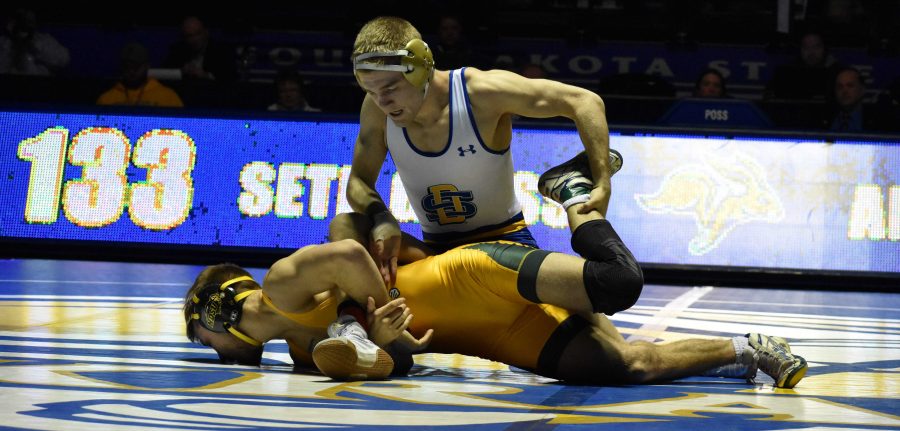 ABBY FULLENKAMP
Junior Seth Gross wrestles against NDSU Cam Sykora during the 133-pound bout Feb. 16. Gross defeated Sykora by a tech fall of 16-0 with a time of 4:00.