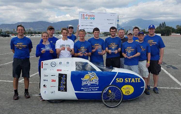 Human Powered Vehicle team after winning the E-Fest West Regional at Pomona, California, March 25.
Greg Michna (adviser), Anna Fasen (sophomore, Big Lake, MN), Evan Tebay (freshman, Huron), Evan Fick (sophomore, Garretson), Cody Reed (senior, Elk Point), Eric Looyenga (senior, Webster), Josh Zwinger (senior, Dimock), Alex Gray (junior, Barrington, NH), Dan Shultz (senior, Sioux Falls), Cole Sullivan (senior, Lakeville, MN), Sam Reski (senior, Sioux Falls), Jason Scheffert (junior, Valparaiso, NE), Brennen Wally (graduate student, Chaska, MN)