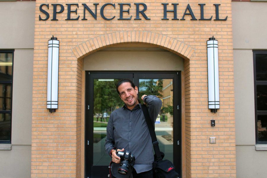 MIRANDA SAMPSON
Frank Robertson, instructor at the School of Communication and Journalism, poses in front of Spencer Hall which is named after his late mother, Velva Lu Spencer, who was the Native American student adviser during her time on campus.