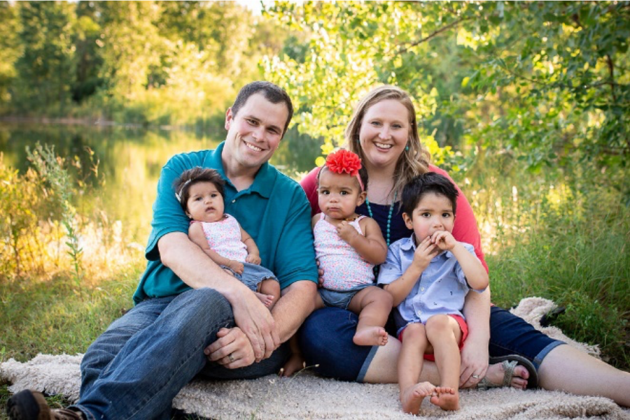 KATE HEIBERGER PHOTOGRAPHY
Cody and Mary Christensen pose with their children Kenzie, Jade and Isaac.