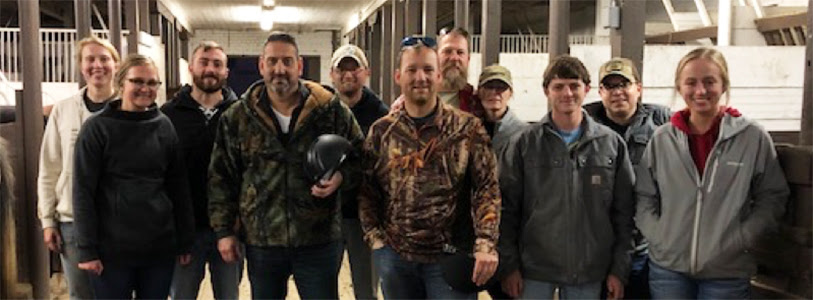 Russ Chavez, director of Veterans Affairs at South Dakota State University, stands with several participants after a recent Horses for Heroes ride. The SDSU Veterans Affairs Office recently received a grant for the Horses for Heroes program. Joining Chavez are, from left: Maddie Kohrman; Mackenzie Krcil; Chance James; Chavez; Derek Putnam; Justin Dicks; Andy Ellis, co-adviser of Armed Forces Association and SDSU faculty member; Cory Ann Ellis; Hunter Gregerson; Eric Gednalske and Kaitlyn Meadors.