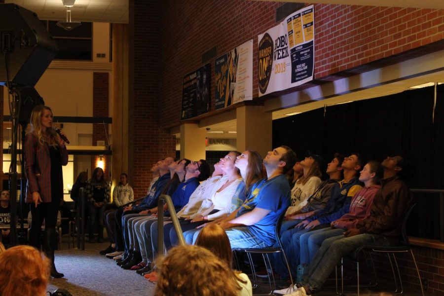 Comedy hypnotist “Lizzie the Dream Girl” hypnotises participating students at the 2019 Hobo Night Live.