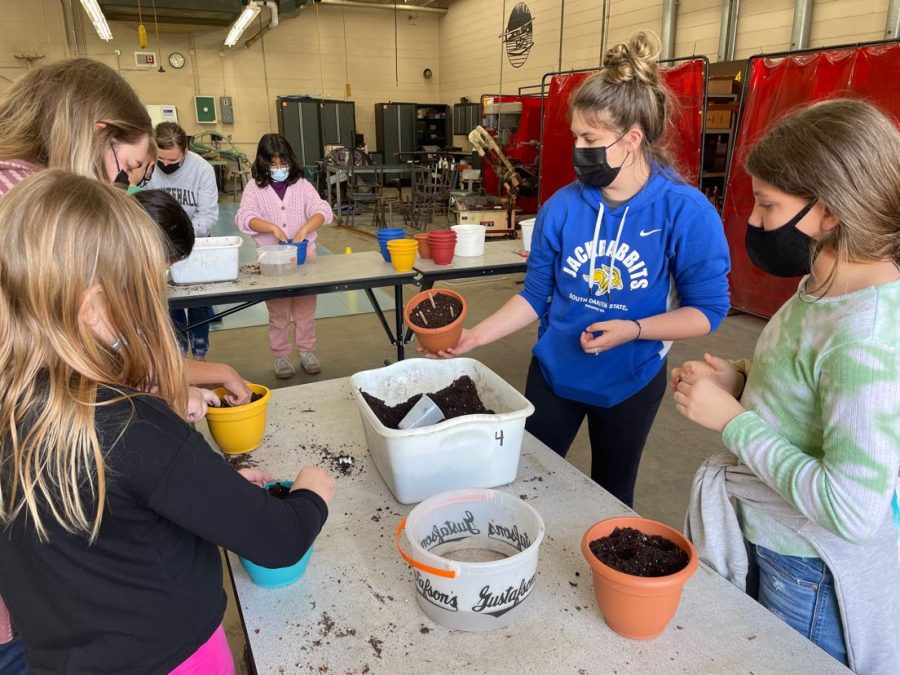 Kendra Goplin hosted many after school programs on Thursday afternoon, during the lesson pictured above, she demonstrated how to plant Mother’s Day pots.
