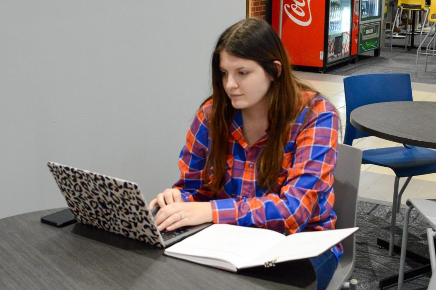 Samantha Sween, a senior at SDSU, busies herself with studying to kick off her final semester.
