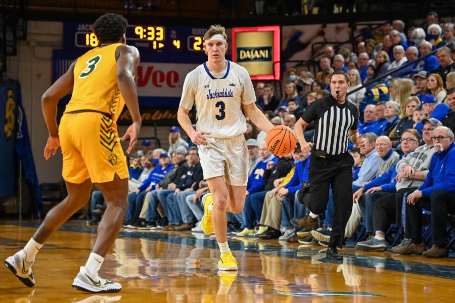Baylor Scheierman runs the ball up the court against the Bison in a game earlier this year. The 6-foot-6 sophomore leads the Jackrabbits in scoring with an average of 15.5 points per game. 