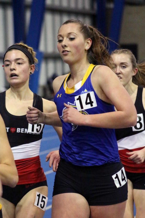 Bridget Henne cruises through the women’s 5,000-meter event at the Indoor Classic track meet Friday afternoon.
