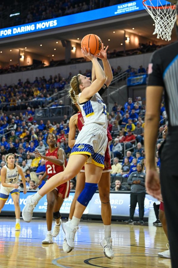 Myah Selland goes up for a shot Saturday afternoon in SDSUs quarterfinal win over Denver at the Denny 
Sanford PREMIER Center. Selland finished with a game-high 26 points in the win.