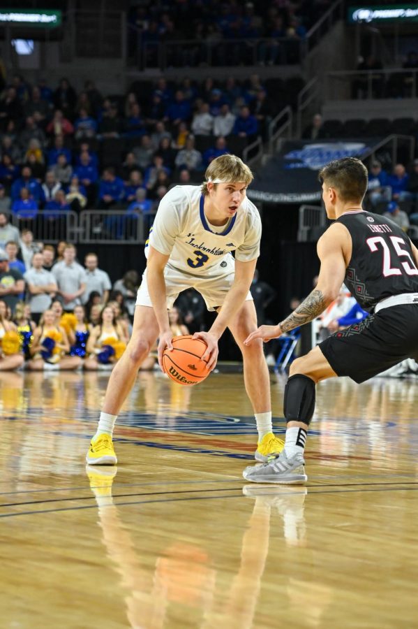 Baylor Scheierman with the ball against Omaha in Sioux Falls at the Summit League Tournament. He finished with 20 points in the Jacks eight-point win.