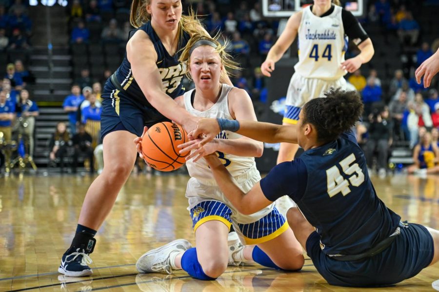 Haleigh Timmer fights for the ball in South Dakota State's semifinal win over Oral Roberts in the Summit League Tournament Monday. Timmer played well off the bench, scoring 12 points and chipped in two steals.