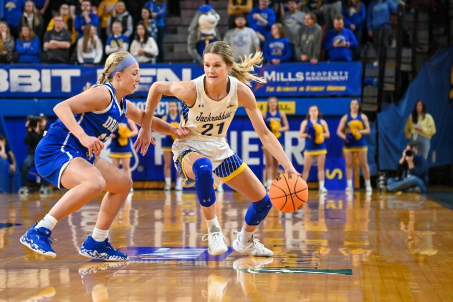 Tylee Irwin drives past a Drake defender Thursday night in the Jacks' 84-66 win over the Bulldogs in the third round of the WNIT. SDSU advances to the quarterfinals to play Alabama Sunday at Frost Arena.