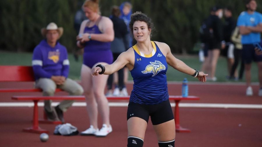 Track and field compete in Vermillion and Arkansas