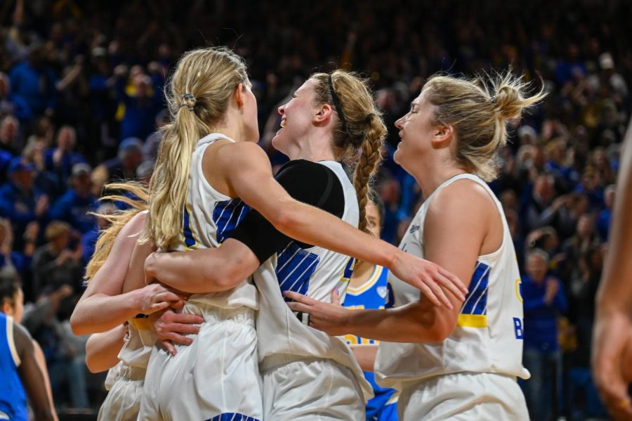 The Jackrabbit womens basketball team celebrates their hard-fought win over UCLA in the WNIT semifinal Thursday night at Frost Arena. This marks the second time the Jacks have beaten UCLA this season, having defeated the then-No.15 Bruins 76-66 in November.