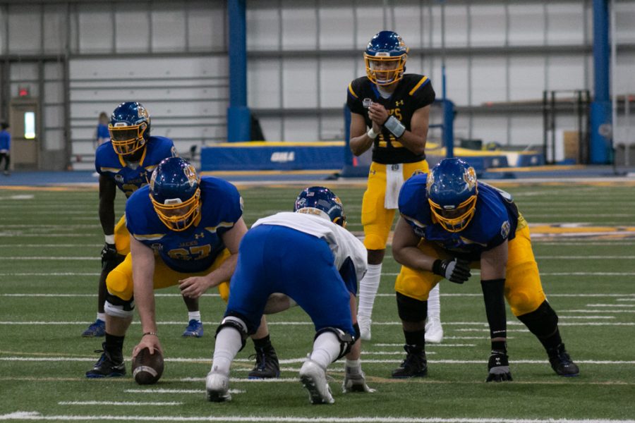 SDSU quarterback, Jon Bell, is in a shotgun formation in the Jackrabbits’ annual spring game. Despite an early interception, the redshirt freshman showed some promise as the Jacks offense scored 57 points.
