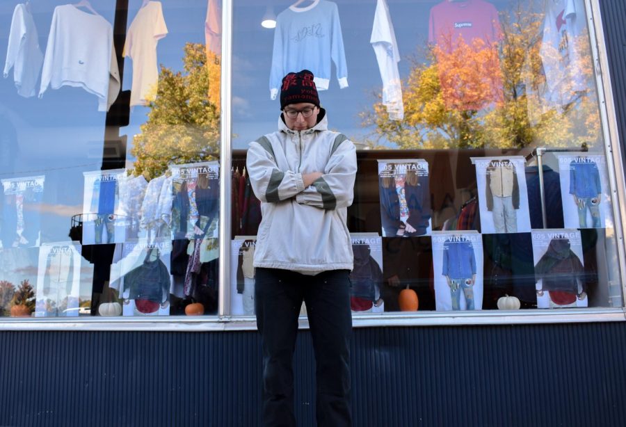 Store owner, Trevor Swift Hawk, stands outside of his new storefront