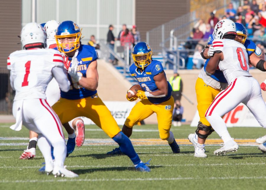 South Dakota State running back Amar Johnson carries the ball in a Missouri Valley Conference football game against USD at Dana J. Dykhouse Stadium.