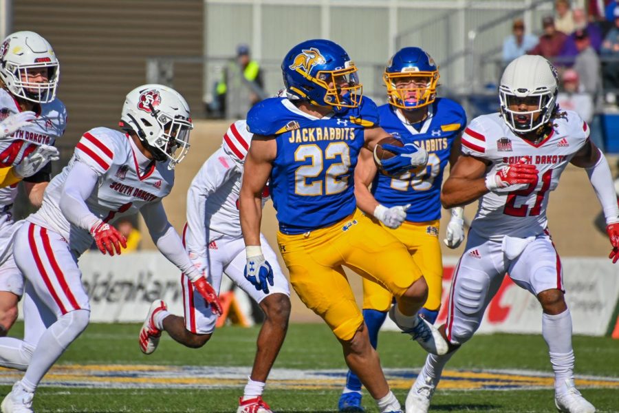 South Dakota State running back Isaiah Davis carries the ball in a Missouri Valley Football Conference Game against the USD Coyotes Oct. 8.
