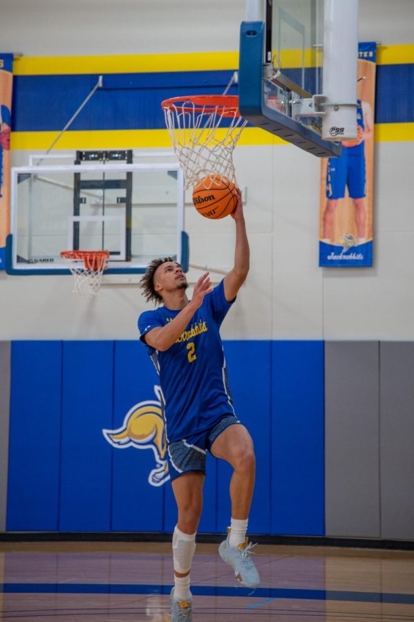 Mayo goes for a layup at SDSU practice in the offseason. The 6-3 guard averaged 9.6 points and started in 21 of SDSUs 35 games last season. The Jacks did not lose a game until the NCAA Tournament game vs. Providence once Mayo was inserted into the starting lineup.
