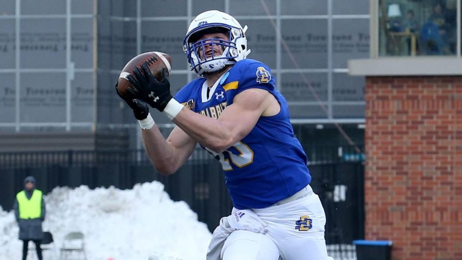 South Dakota State wide receiver Jaxon Janke catches a pass in a FCS playoff game at Dana J. Dykhouse Stadium Saturday against Holy Cross Dec. 10.