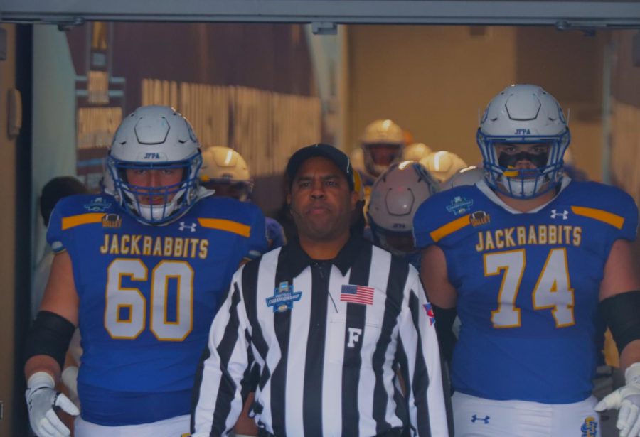 South Dakota States Mason McCormick (60) and Garret Greenfield (74) prepare to lead the Jackrabbits onto the field at Toyota Stadium in the FCS national championship game Jan. 8 in Frisco, Texas.