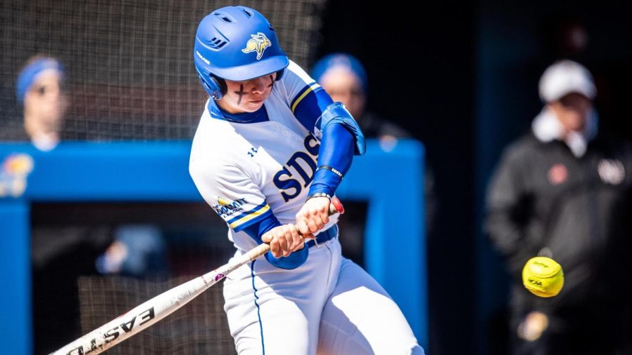 Jackrabbit outfielder Jocelyn Carrillo swings the bat in a NCAA softball game against Kansas March 12 at the Jayhawk Invitational. The Jacks faced Kansas in a doubleheader and the teams split the two games. SDSU won the first 2-1 and Kansas won the second 5-3.