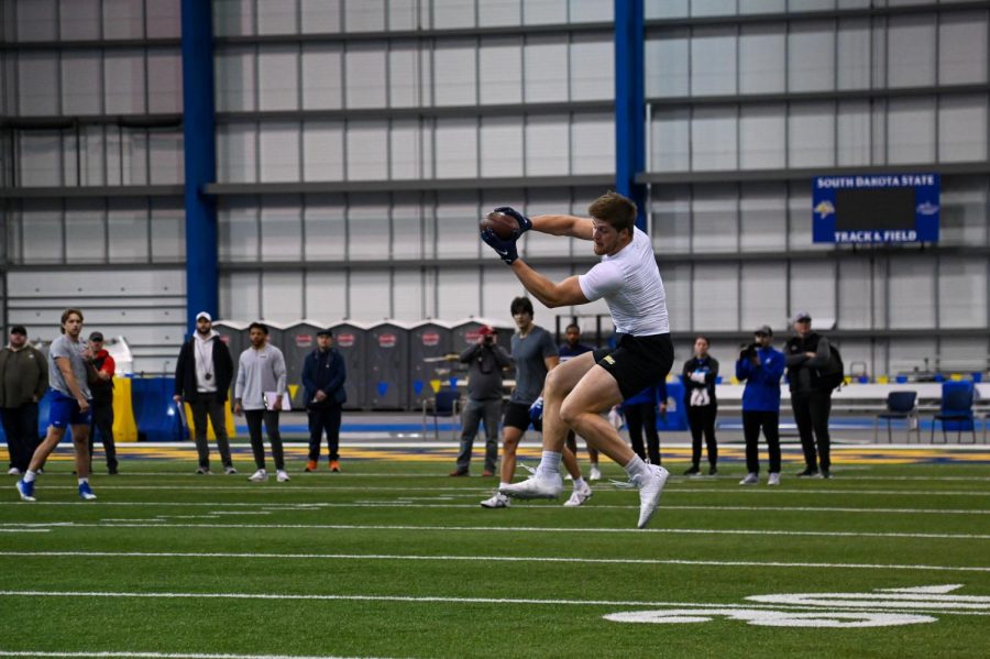 South Dakota State tight end Tucker Kraft catches a pass during a receiving drill at SDSU Pro Day March 31 at the Sanford Jackrabbit Athletic Complex.