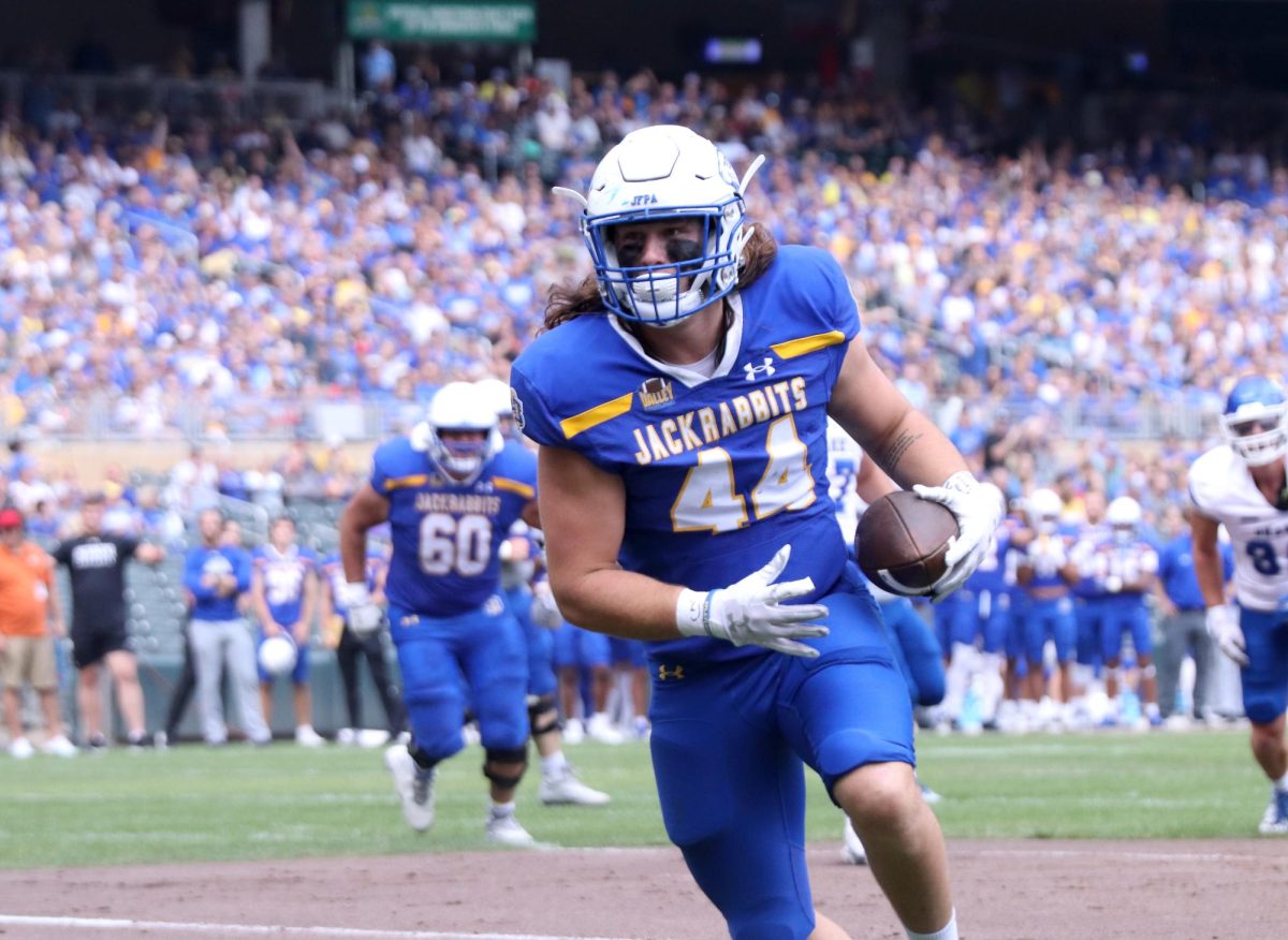 Kevin Brenner (44) runs into the end zone for a touchdown against Drake Saturday, Sept. 16 at Target Field in Minneapolis, Minn. SDSU scored 10 touchdowns in a big 70-7 win over the Bulldogs.