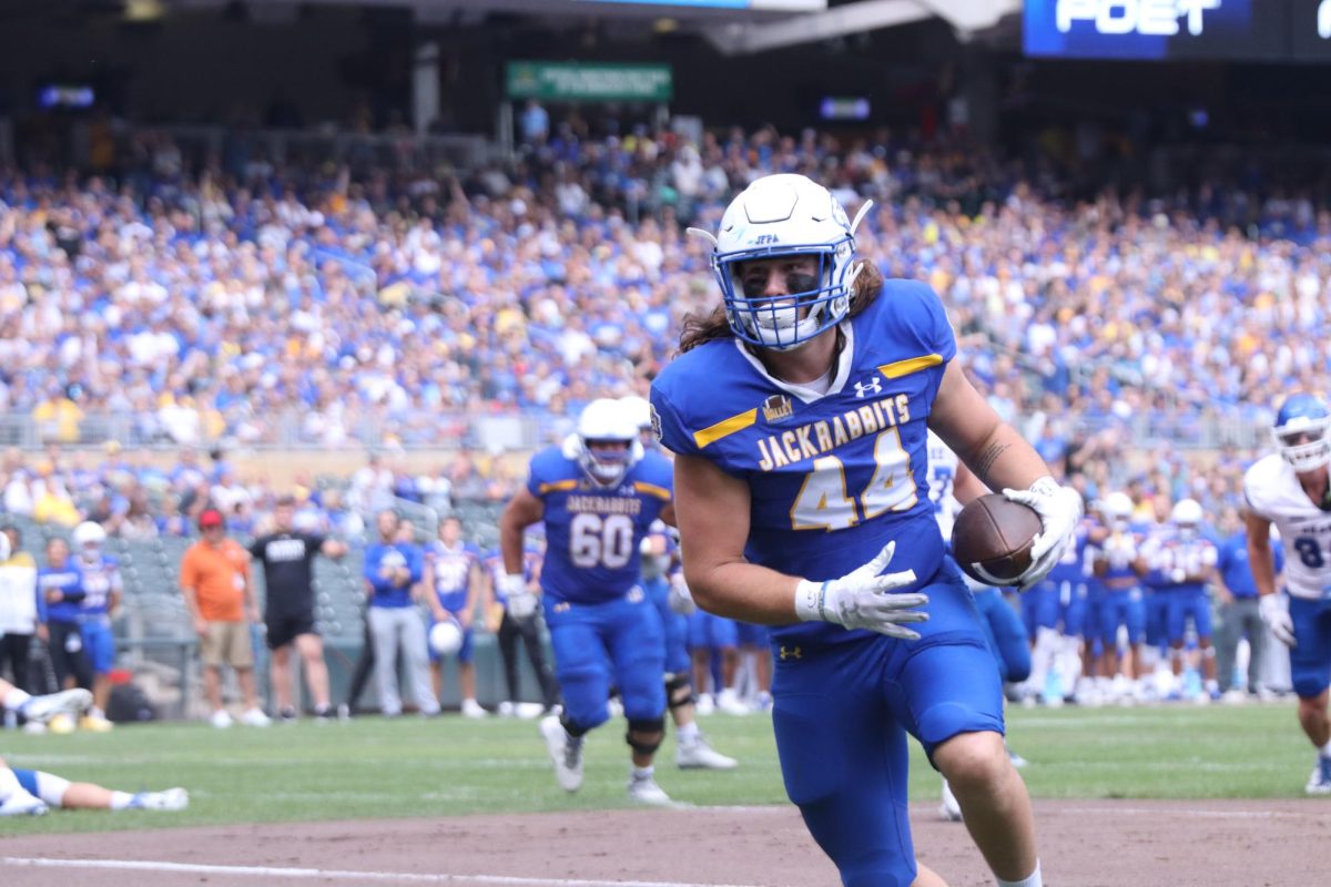 Kevin Brenner (44) runs into the end zone for a touchdown against Drake Saturday, Sept. 16 at Target Field in Minneapolis, Minn. SDSU scored 10 touchdowns in a big 70-7 win over the Bulldogs.