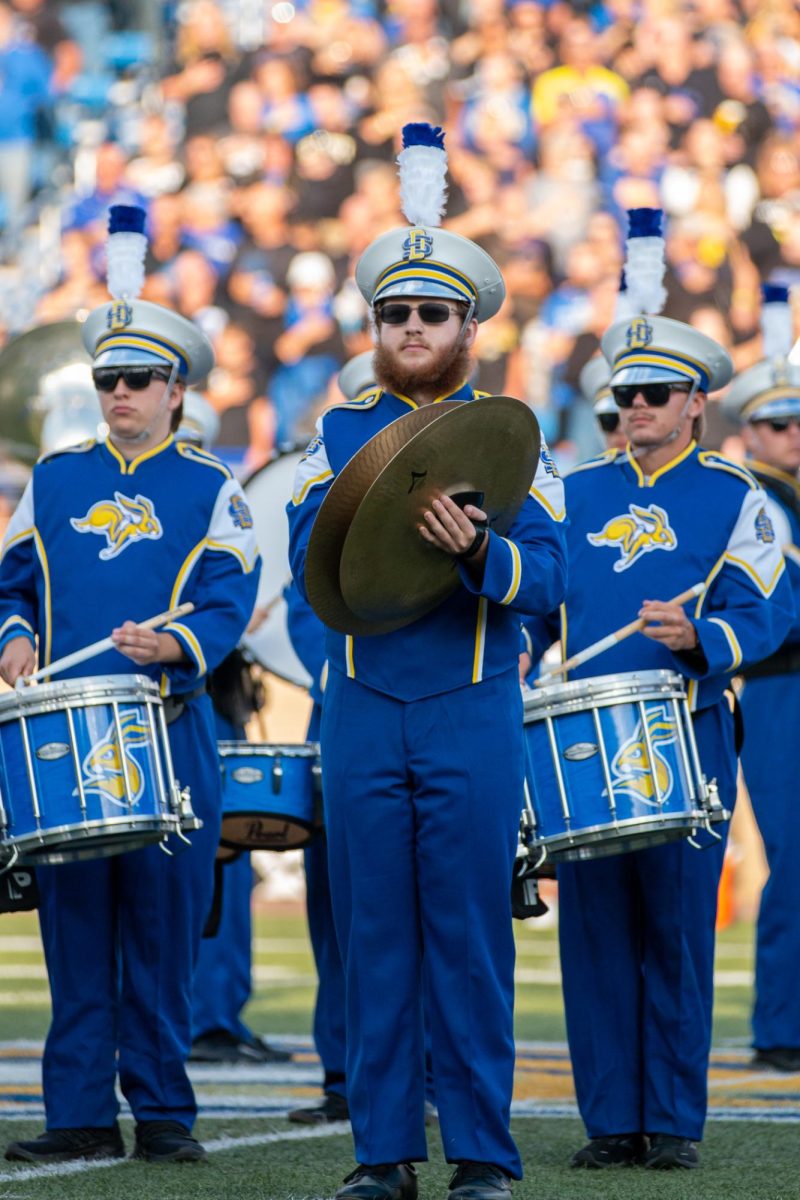 The Pride of the Dakotas Marching Band performs during halftime of the South Dakota State vs. Montana State football game Saturday.