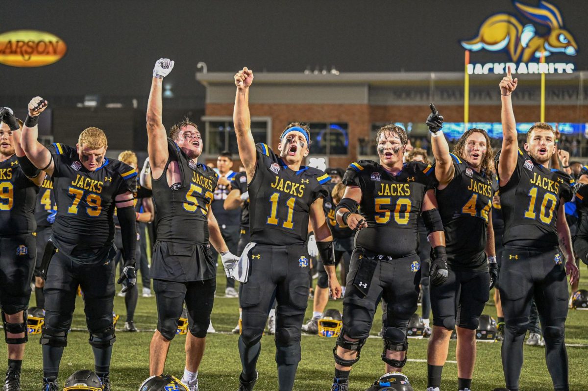 The SDSU football team celebrates after its 20-16 win over the Montana State Bobcats at Dana J. Dykhouse Stadium. The Jackrabbits keep their No. 1 overall rank in the Football Subdivision Conference.