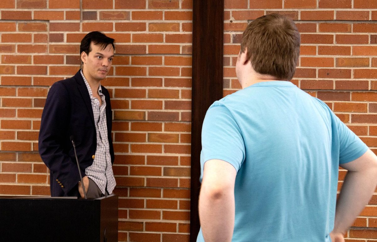 Journalist Arijit (Ari) Sen, left, speaks with a student after his lecture titled (AI and Journalism: Looming Threat or Massive Opportunity) in the Lewis and Clark room in the University Student Union on Thursday, Sept. 28, 2023. 