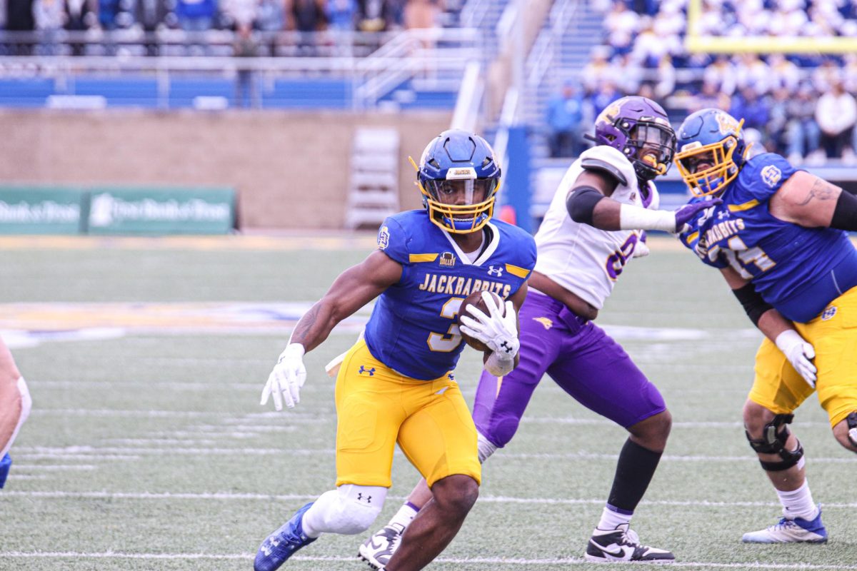 Running Back Amar Johnson carries the ball during the Jack’s 41-6 Hobo Day win over the University of Northern Iowa Oct. 14, 2023.  