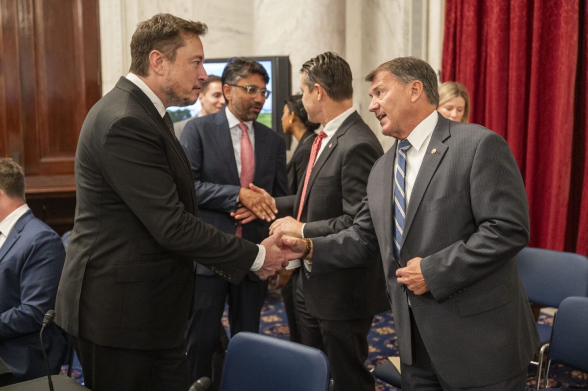 Sen.+Mike+Rounds%2C+R-South+Dakota%2C+right%2C+shakes+hands+with+Elon+Musk%2C+CEO+of+Tesla%2C+X+and+SpaceX%2C+on+Sept.+13%2C+2023%2C+in+Washington%2C+D.C.%2C+during+a+discussion+about+artificial+intelligence.