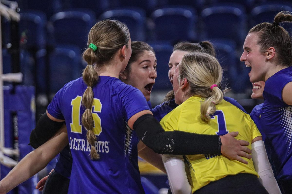 The South Dakota State volleyball team celebrates afer a point is scored during a volleyball match Thursday, Oct. 6, 2023 at Frost Arena in Brookings. The Jackrabbits will travel up I-29 Thursday for an intra-state showdown against UND.