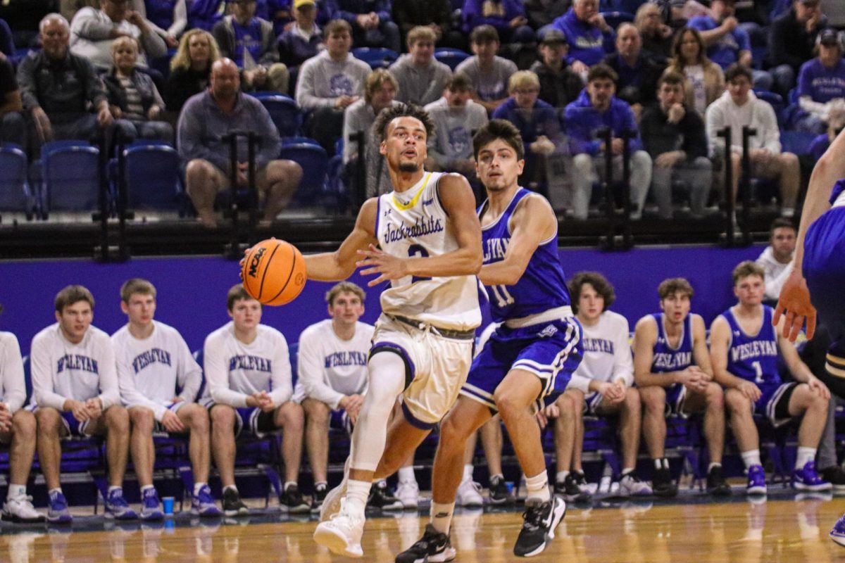 South Dakota State’s Zeke Mayo drives past a DWU defender in the Jacks’ 83-55 win over the Tigers Wednesday, Nov. 8, 2023. Mayo scored 28 of the Jacks’ 83 points contributing in the win.