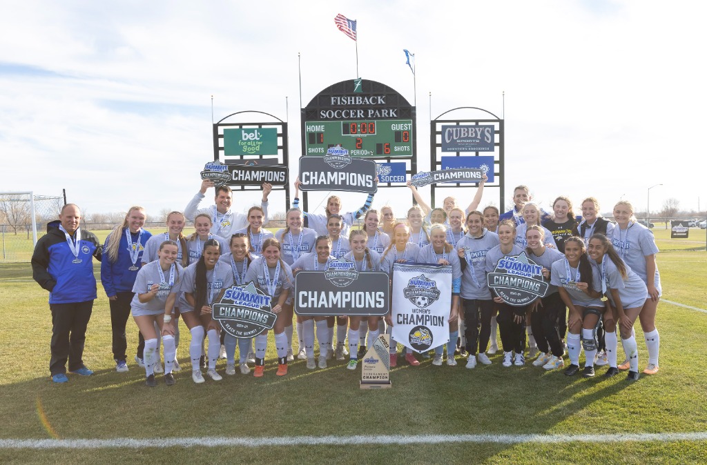 South Dakota State’s soccer team poses with their newly awarded trophy after defeating  Omaha 1-0 on Nov. 5.