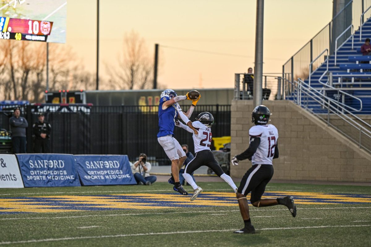 Jadon Janke catches a touchdown pass from Mark Gronowski in the Jacks’ last reular season game Nov. 18 at Dana J. Dykhouse Stadium. Janke finished with 10 catches for 187 yards. 