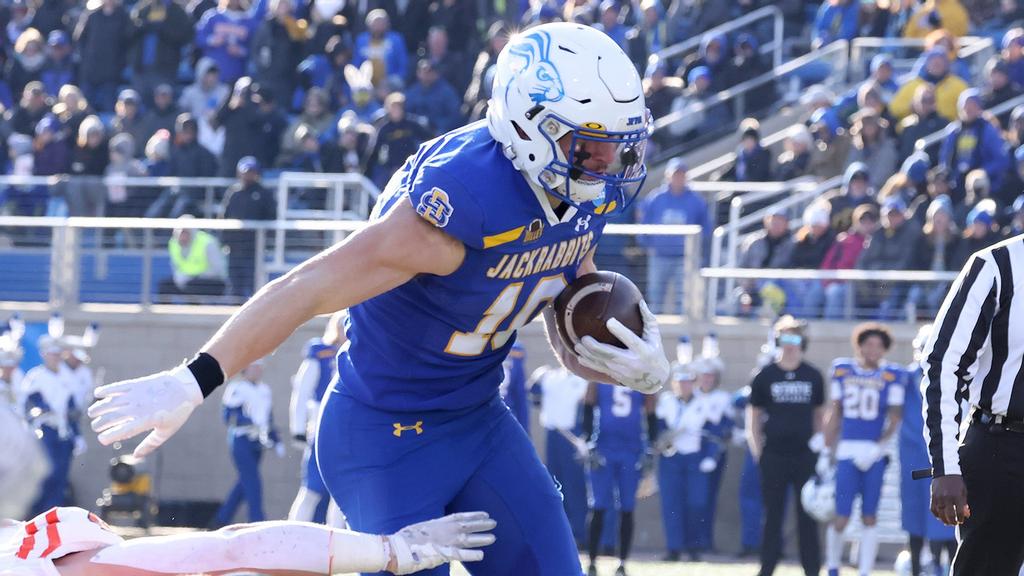 BROOKINGS%2C+SD%3A+DECEMBER+2%3A+Jaxon+Janke+%2310+of+the+South+Dakota+State+Jackrabbits+gets+extra+yards+against+the+Mercer+Bears+at+Dana+J.+Dykhouse+Stadium+in+Brookings%2C+SD.