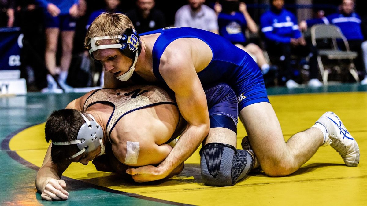 Tanner Sloan of South Dakota State works a tilt on his opponent, Cael Crebs from Navy during the dual between SDSU and NAVY in Hampton, VA Jan, 12. 2024. Sloan defeated Crebs by technical fall 18-0.