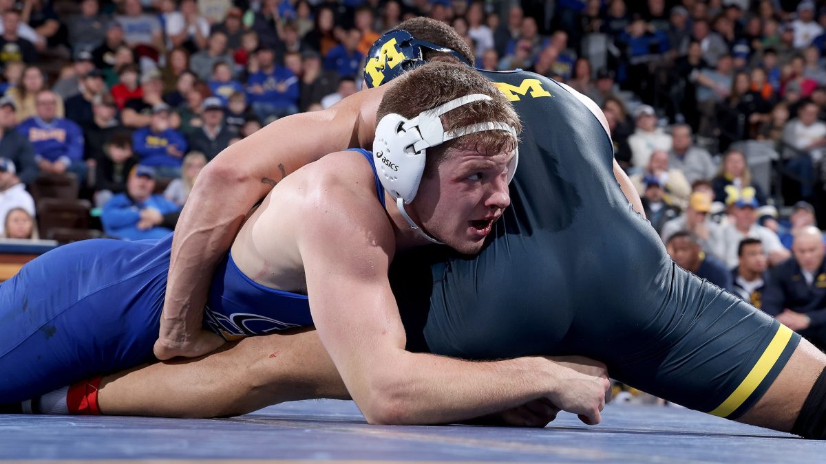 Bennett Berge works to finish a deep shot against Jaden Bullock of Michigan in the dual between SDSU and Michigan at the Pentagon in Sioux Falls, SD Thursday, Jan. 4, 2024. Berge won by major decision 14-5 in the Jacks’ 22-17 win over the Wolverines. 