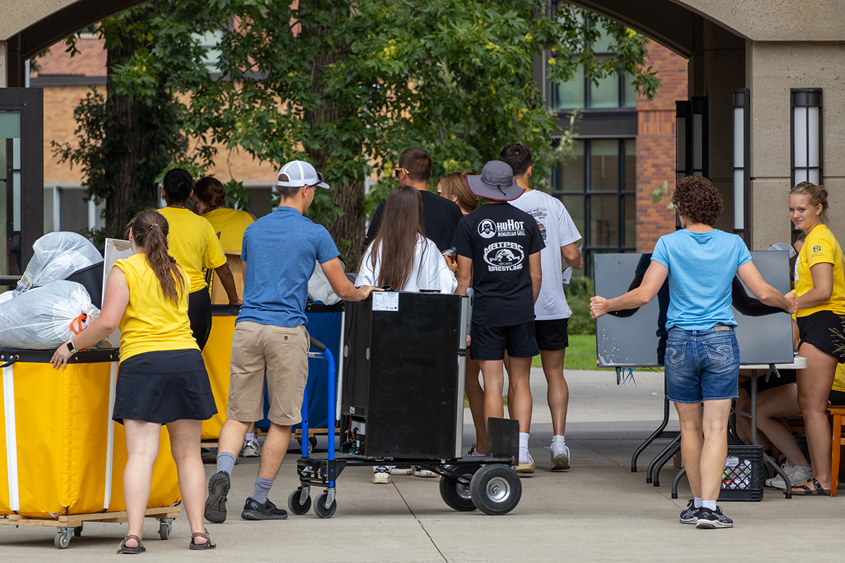 Volunteers and family members help move in the newest freshman class. “We are really excited at South Dakota State University about what we’re projecting for enrollment for the fall 2024 semester,” said Shawn Helmboldt, assistant vice president for enrollment management.