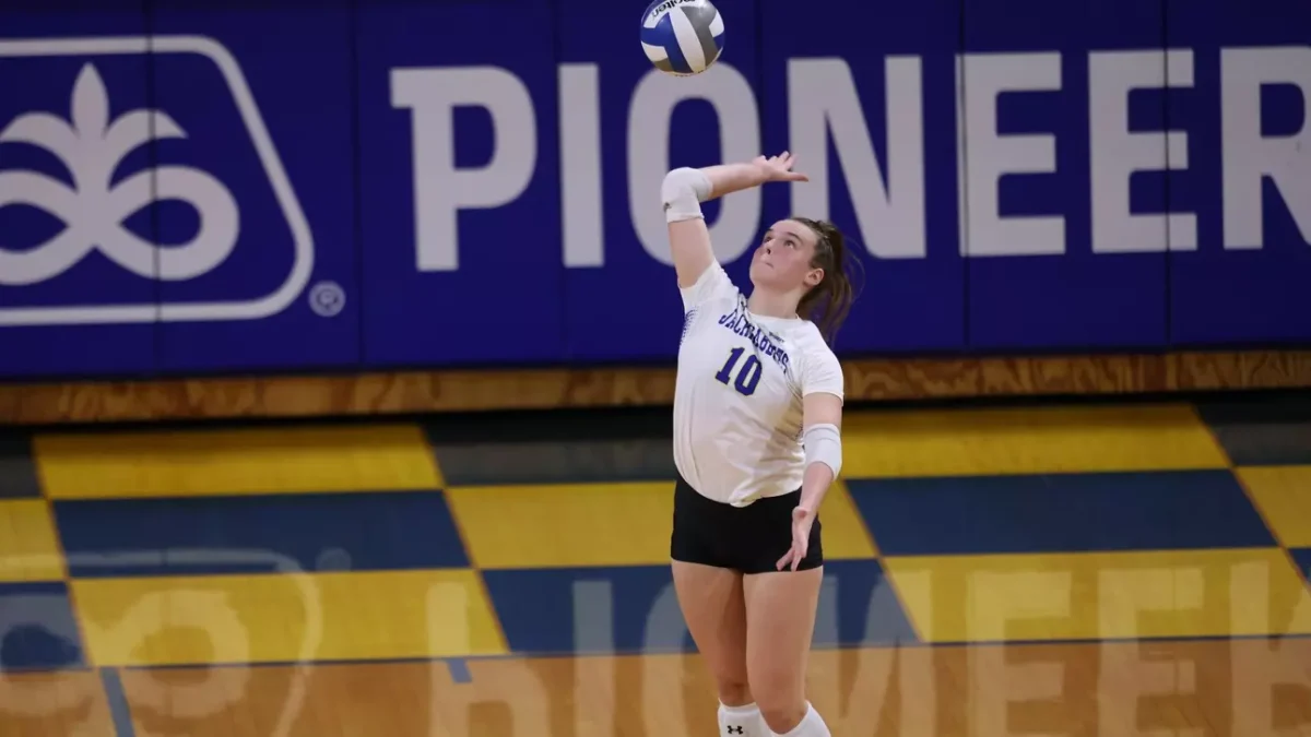 Sylvie Zgonc serves ball to opponent at a home match in 2023.