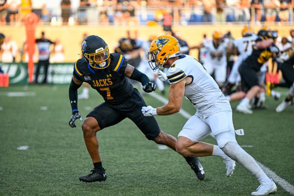 South Dakota State's Dalys Beanum guards former Jackrabbit Canyon Bauer during a college football game against Augustana on Saturday, Sept. 14, 2024, at Dana J. Dykhouse Stadium in Brookings.