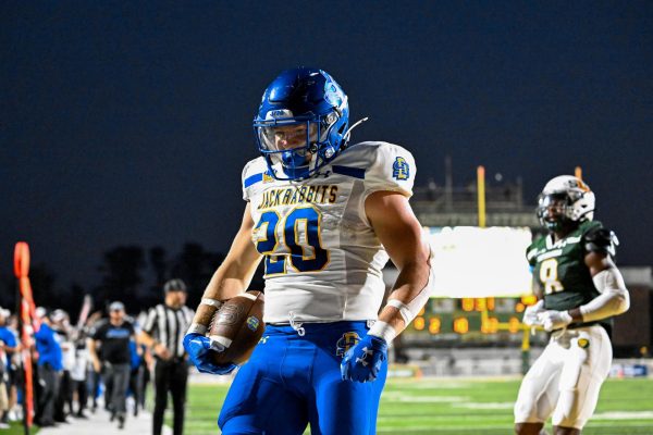 SDSU's Kirby Vorhees flexes after a run against Southeastern Louisiana on Saturday, Sept. 21, 2024 at Strawberry Stadium in Hammond, La. Vorhees had 5 carries totaling 179 and 3 touchdowns against the Lions.