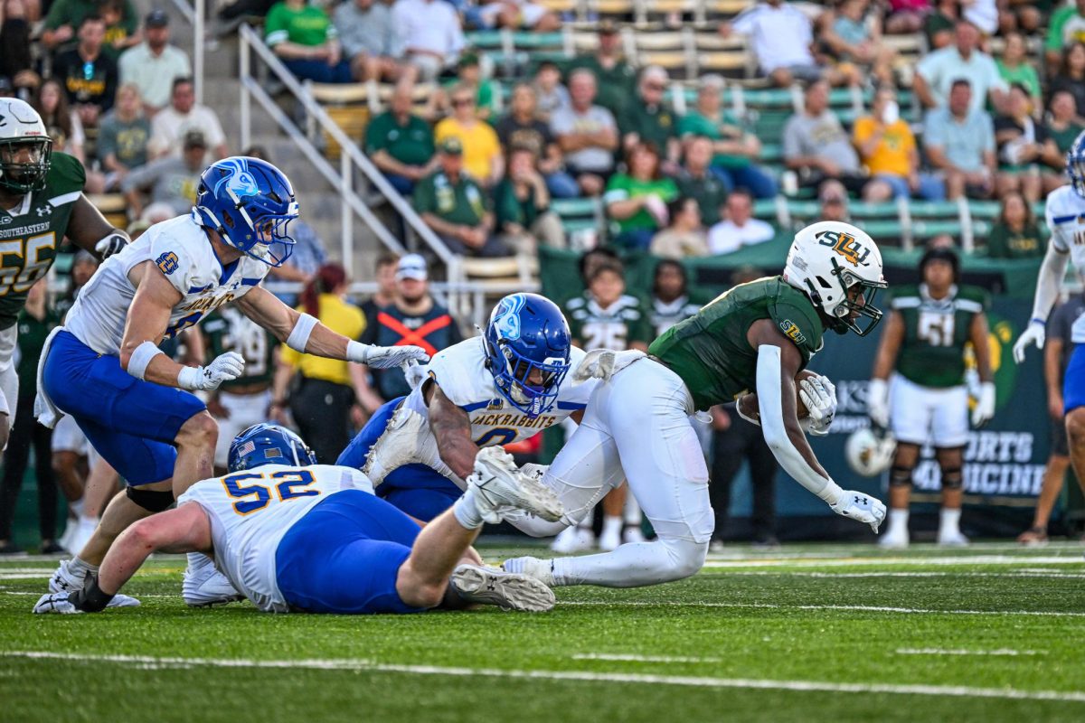 SDSU’s defense attempts to stop the ballcarrier against Southeastern Louisiana on Saturday, Sept. 21, 2024 at Strawberry Stadium in 
Hammond, LA.