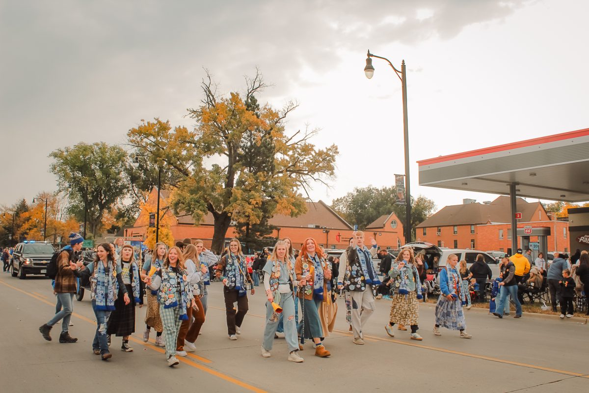 SDSU Students walking in the 112th Hobo Day parade.