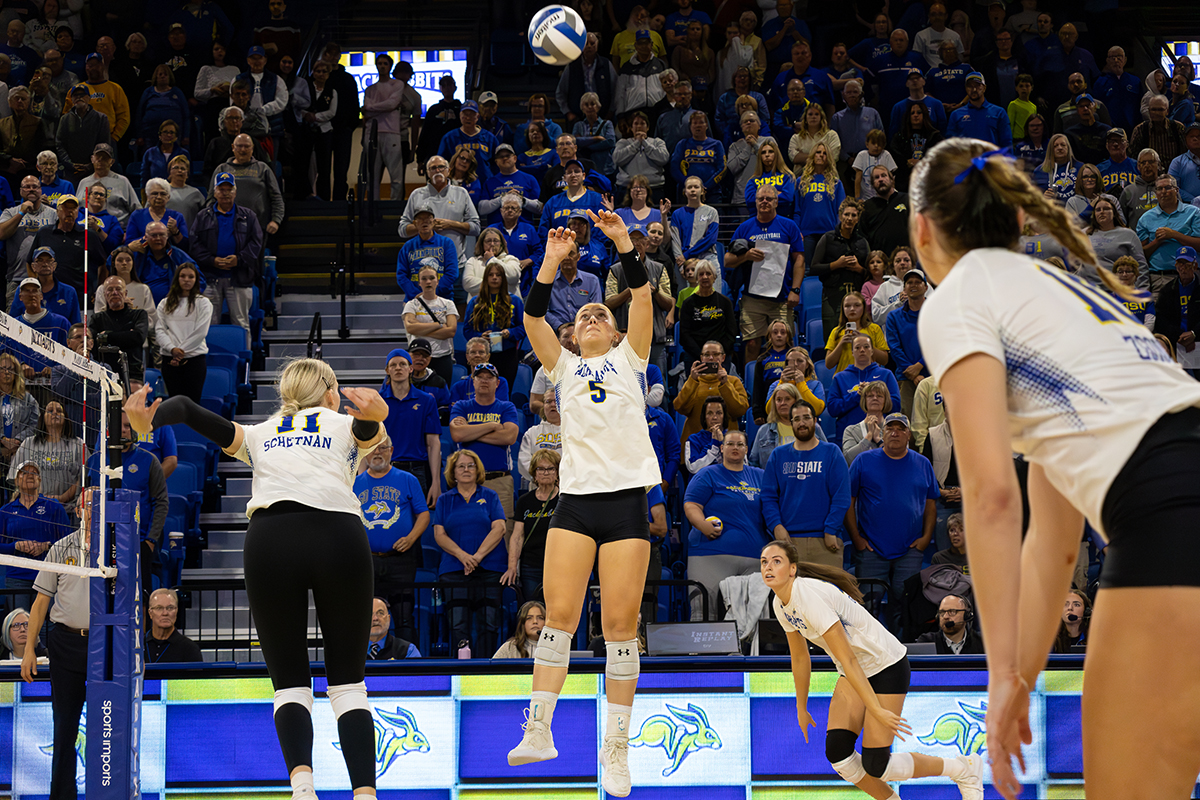 Sophomore Rylee Martin sets the ball during a match last Thursday against Kansas City in the new First Bank & Trust Arena. SDSU beat the Roos 3-0 to run their record to 14-0, the best team start since 2000. 